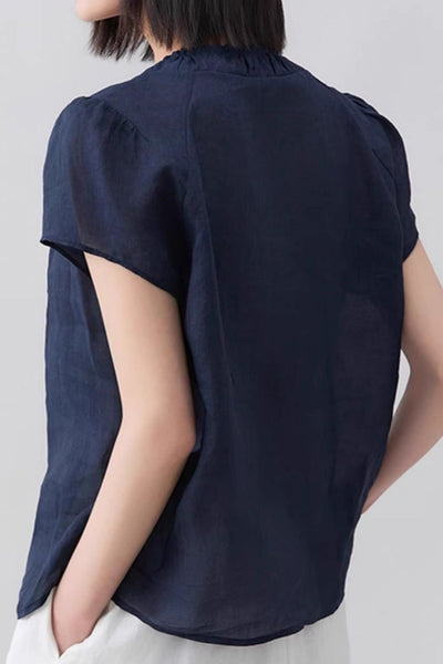 Casual V-neck gathered loose shirt.