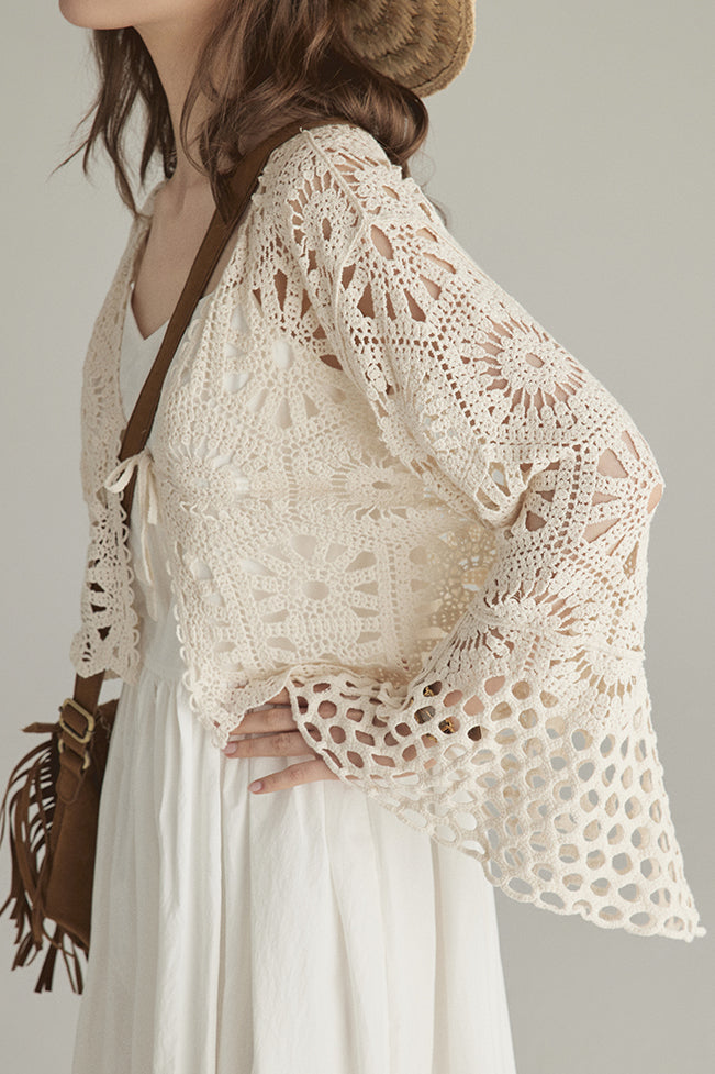 Hollowed-out knitted outerwear