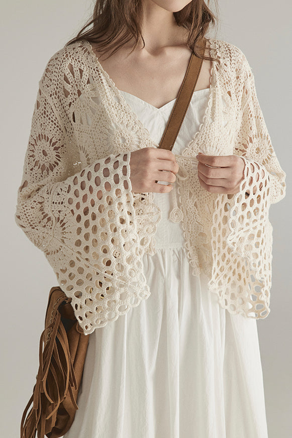 Hollowed-out knitted outerwear