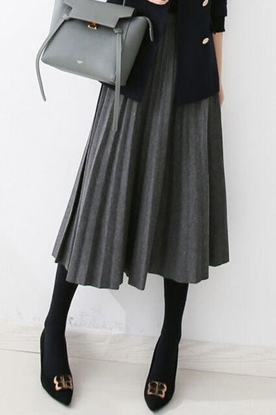 Early autumn woolen pleated midi skirt