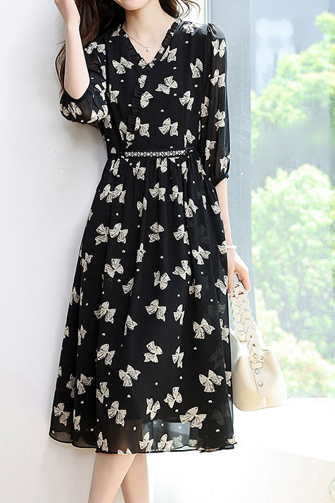 Early autumn trendy bow-printed dress