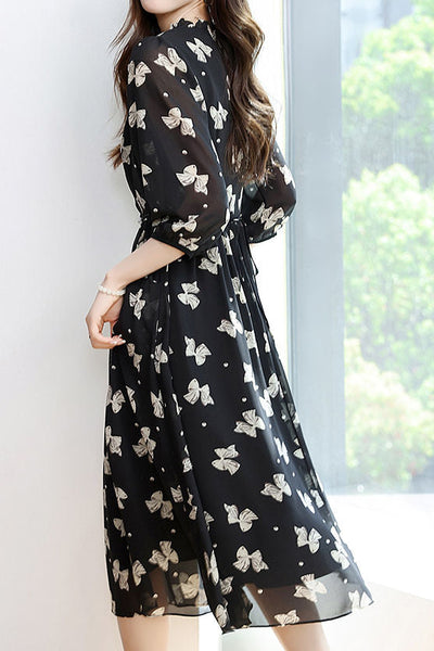 Early autumn trendy bow-printed dress
