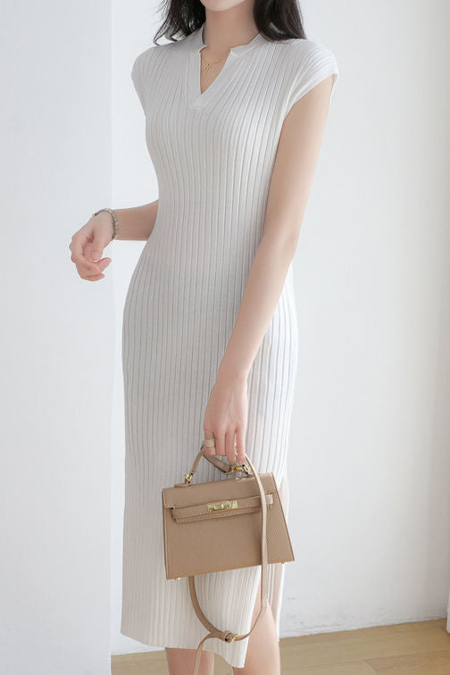 V-neck cap sleeve fitted dress with side slits in ribbed knit