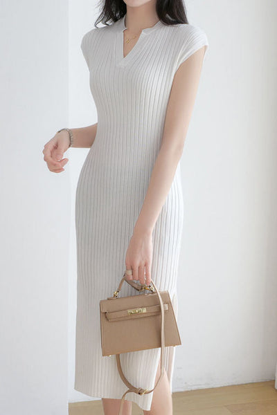 V-neck cap sleeve fitted dress with side slits in ribbed knit