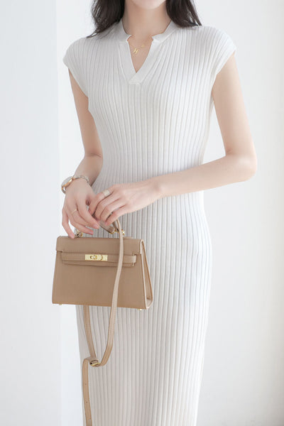 V-neck cap sleeve fitted dress with side slits in ribbed knit